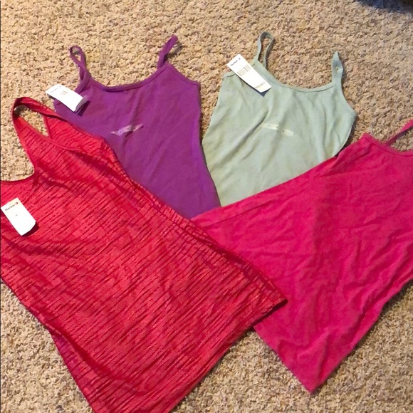 Buckle Tops - Three new tank tops and one like new! Buckle Tops - Three new tank tops and one like new!
